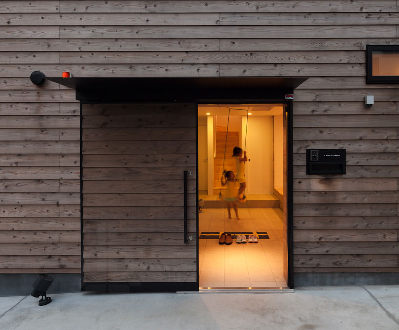 level architects' house in ofuna sports a deeply angled roofline