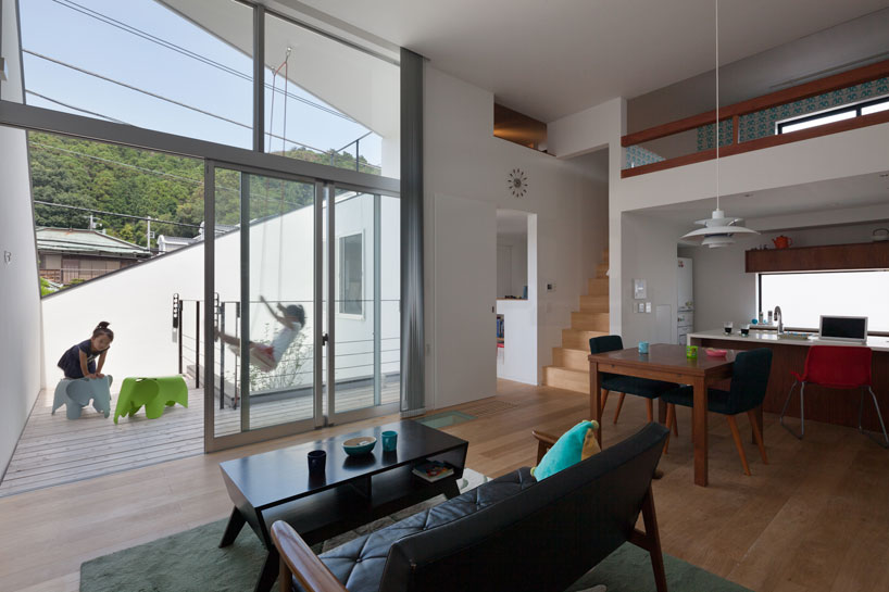 level architects' house in ofuna sports a deeply angled roofline