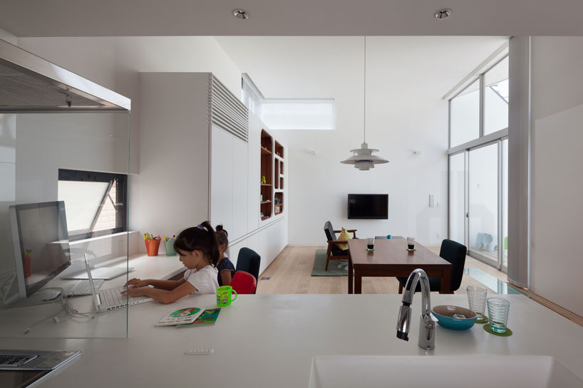 level architects' house in ofuna sports a deeply angled roofline