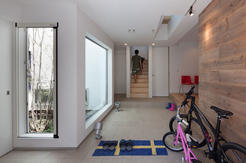 level architects' house in ofuna sports a deeply angled roofline