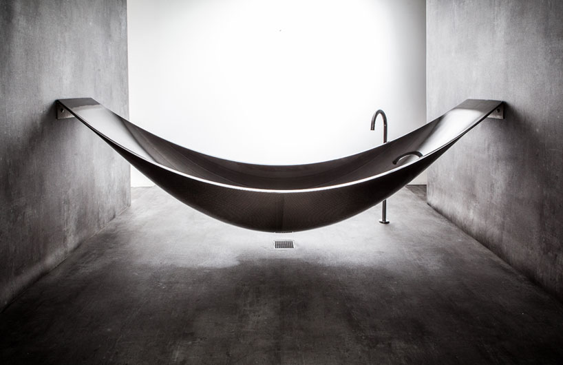 a hammock-shaped carbon fibre bathtub by splinter works