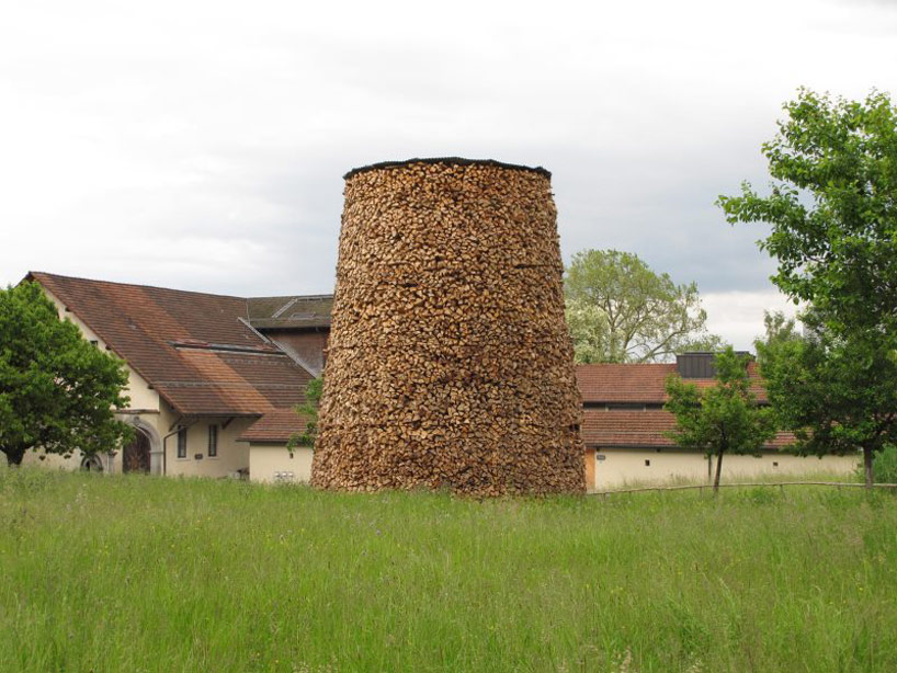 over 2000 wood pieces used in log tower by tadashi kawamata