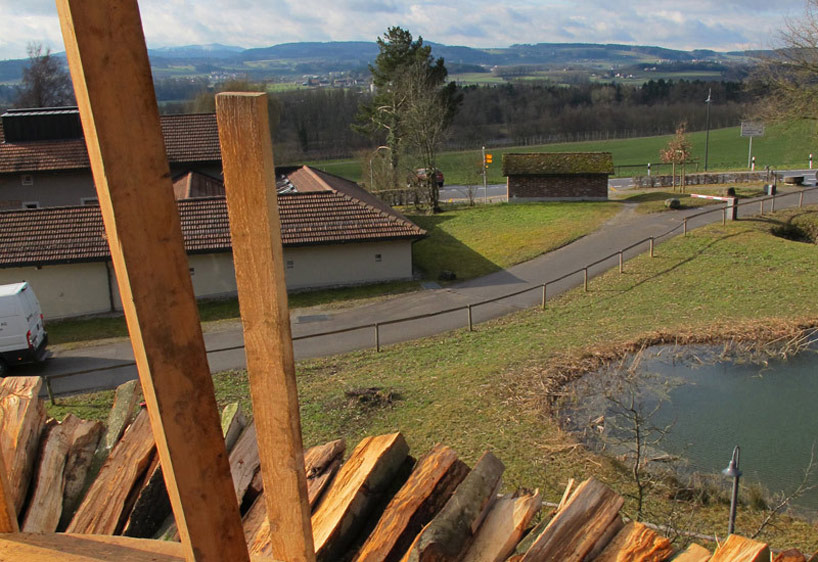 over 2000 wood pieces used in log tower by tadashi kawamata