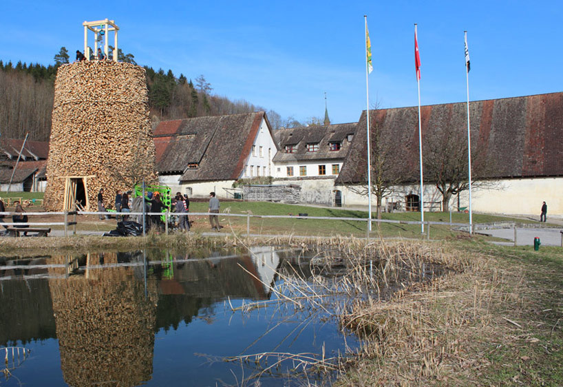over 2000 wood pieces used in log tower by tadashi kawamata
