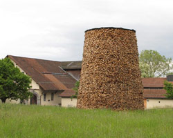 over 2000 wood pieces used in log tower by tadashi kawamata