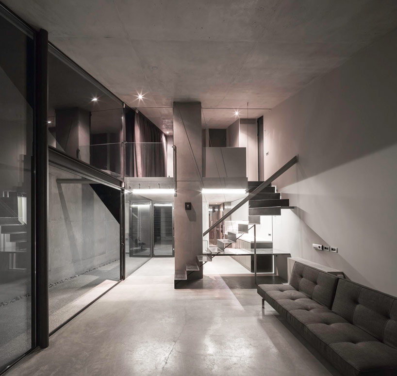 tense architecture network embeds home into a greek hill 