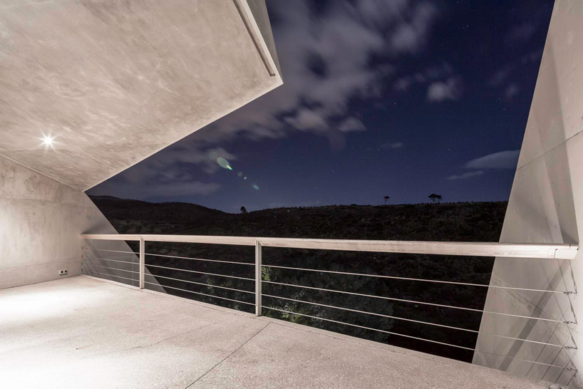 tense architecture network embeds home into a greek hill 