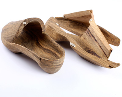 hang it wooden shoes by tal weinreb