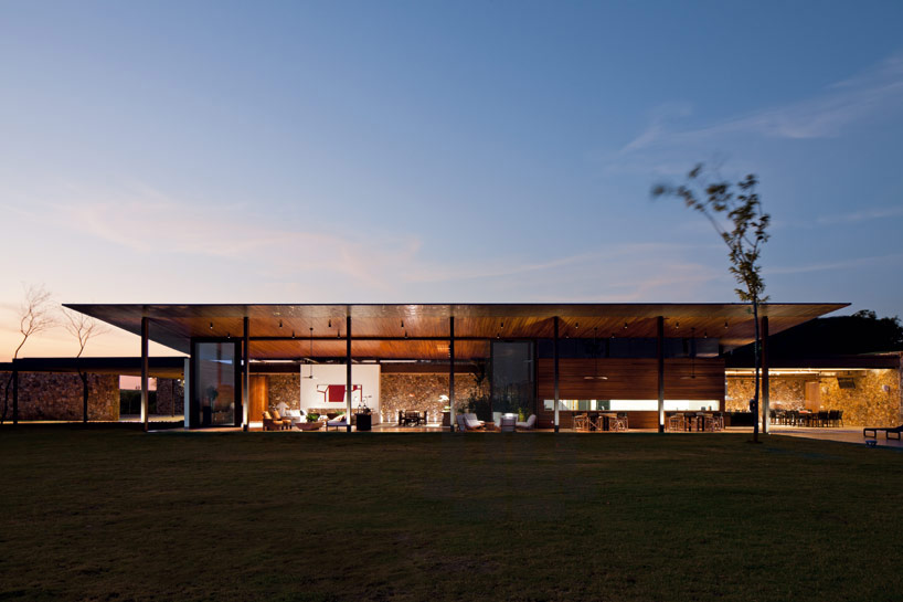jacobsen arquitetura's BV house stretches over the landscape  