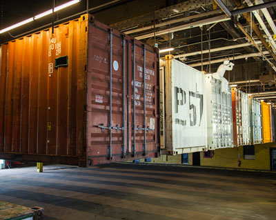 magic carpet of 36 shipping containers hang at pier 57
