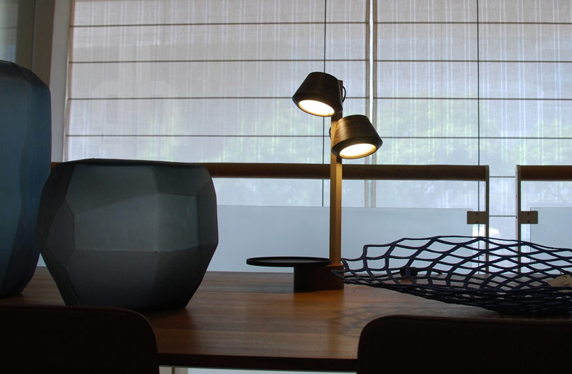 hanging coconut table lamp by nir meiri design studio
