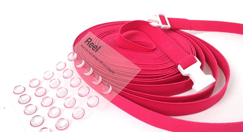 reel elastic bike frame storage system by areum jeong