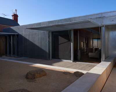 sean godsell's edward street house sports grated metal skin