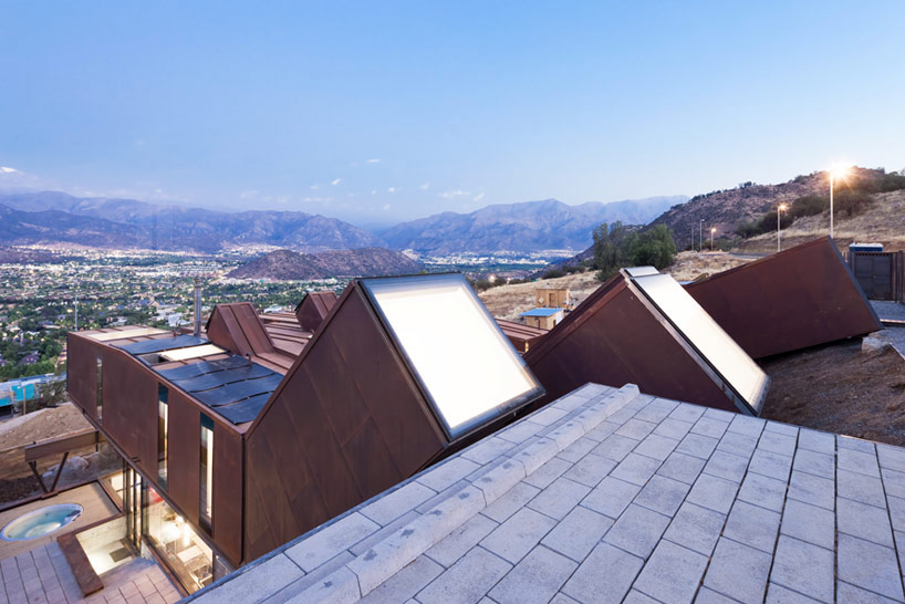 casa oruga: shipping container home snakes across the andes