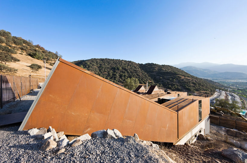 casa oruga: shipping container home snakes across the andes