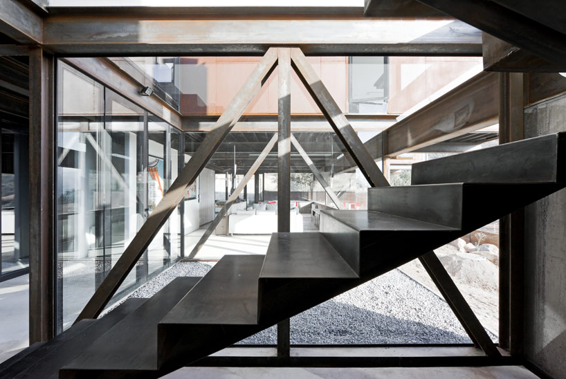 casa oruga: shipping container home snakes across the andes