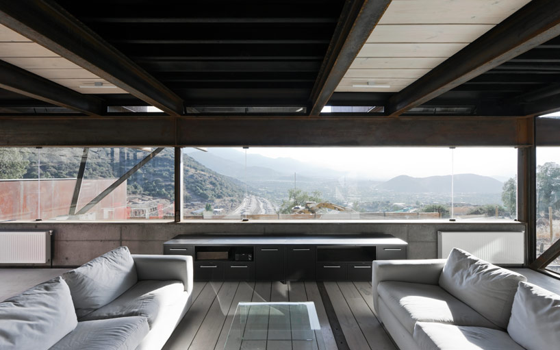 casa oruga: shipping container home snakes across the andes