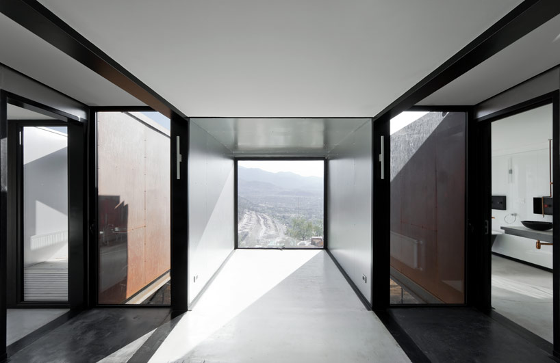 casa oruga: shipping container home snakes across the andes
