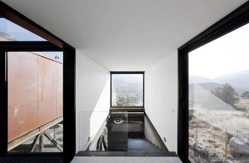 casa oruga: shipping container home snakes across the andes