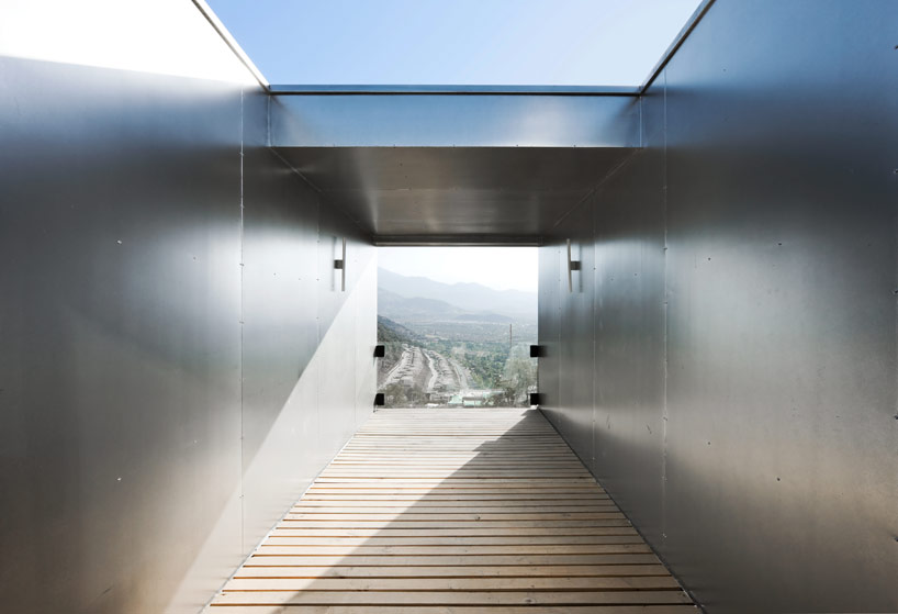 casa oruga: shipping container home snakes across the andes