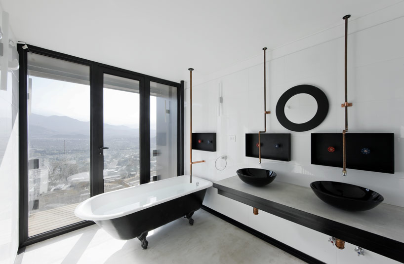 casa oruga: shipping container home snakes across the andes