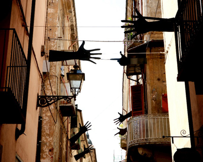 suspended hand gestures of war + peace by meinero emanuele