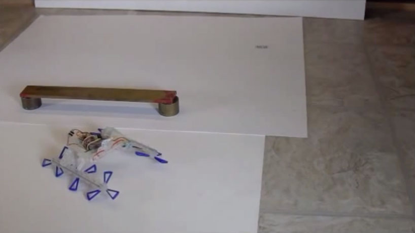 3D printed robot slides under doors and travels up to 5.2m/s
