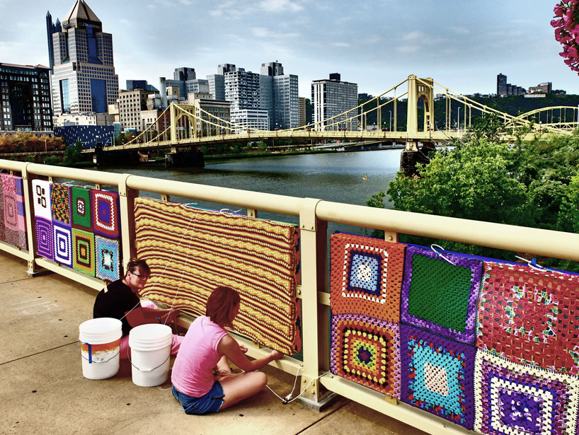 andy warhol bridge blanketed in over 600 knittings