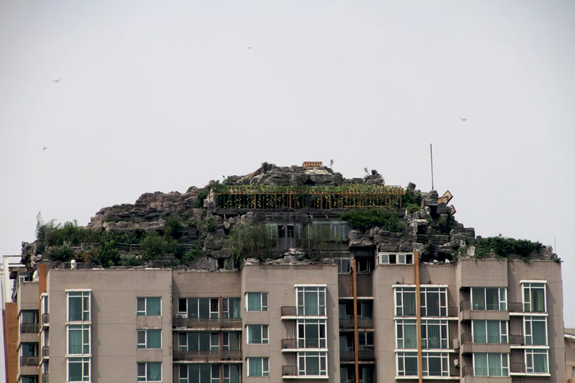 chinese doctor builds illegal mountaintop villa on bejing hi-rise