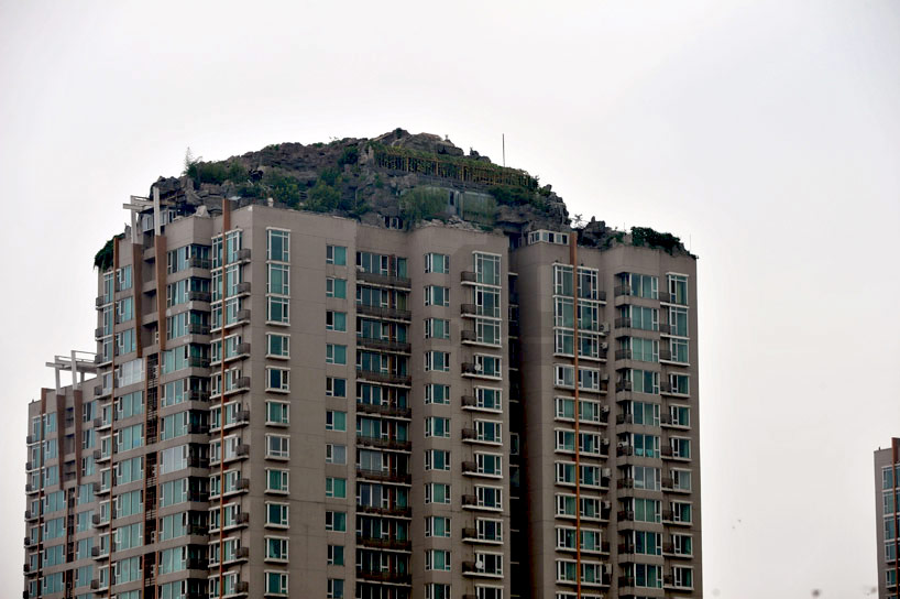 chinese doctor builds illegal mountaintop villa on bejing hi-rise
