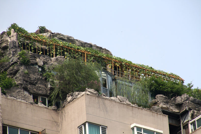 chinese doctor builds illegal mountaintop villa on bejing hi-rise