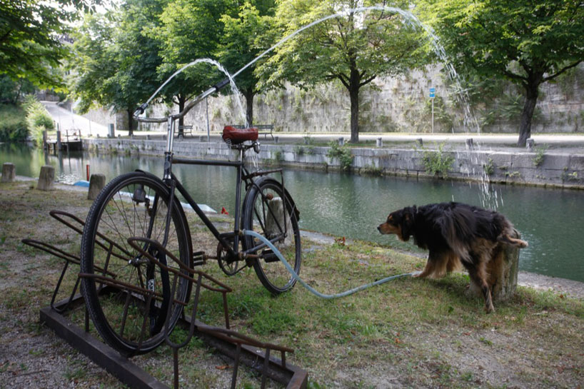 old bike reimagined as a water fountain by brad downey