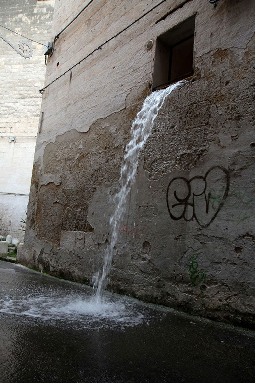 old bike reimagined as a water fountain by brad downey