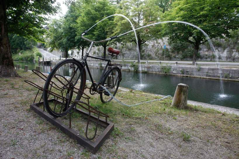 old bike reimagined as a water fountain by brad downey