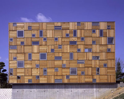 milligram architectural studio designs house as nestled box