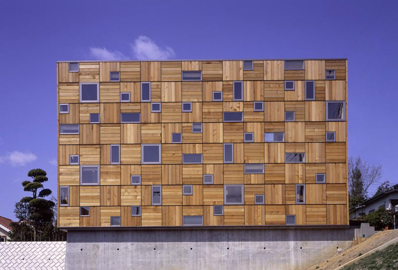 milligram architectural studio designs house as nestled box