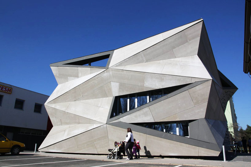 atrium studio turn heat exchanger into culture + sports center