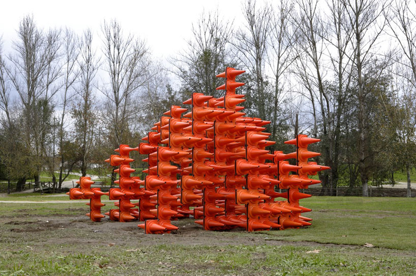 interactive orange traffic cone sculpture by LIKEarchitects