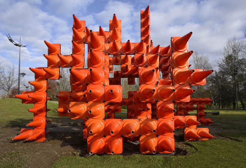 interactive orange traffic cone sculpture by LIKEarchitects