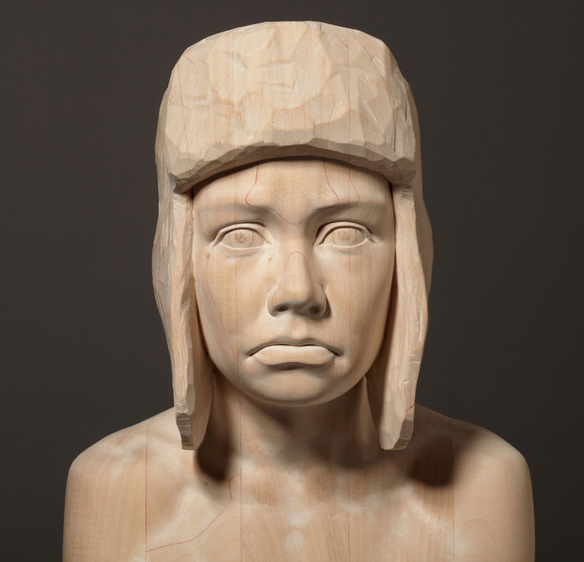 mario dilitz: lifesize wooden sculptures bear human emotion