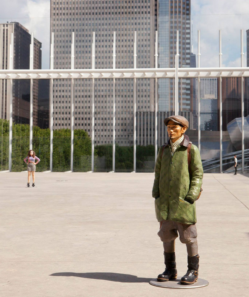 miniature woodcarvings of urban youths by tomoaki suzuki