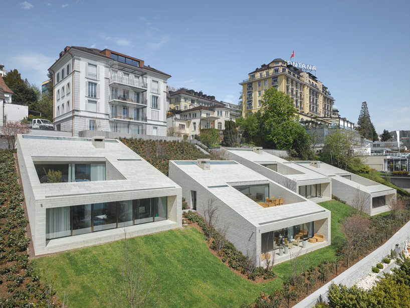 urban villas on lake lucerne create hillside periscopes 
