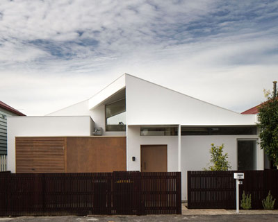 C house offers a private courtyard space by adrian bonomi