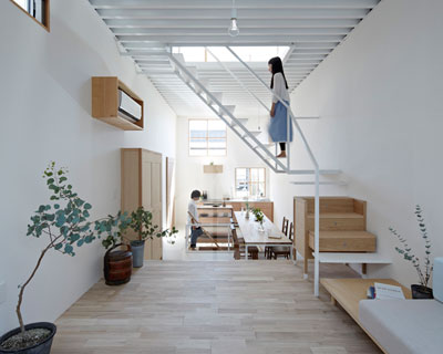 house in itami by tato architects sits on a narrow cul-de-sac