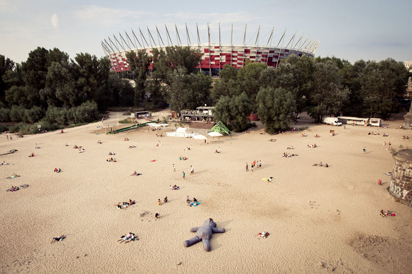 the cuddly: a giant plush teddy takes to the streets of warsaw
