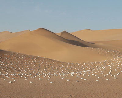 shi shaoping installs 3,000 ceramic eggs in desolate locations
