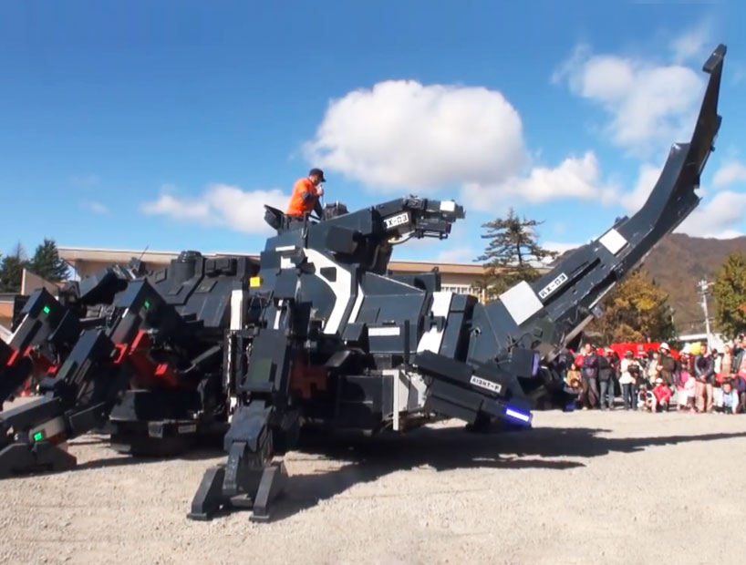 giant robotic beetle hits the streets of japan 