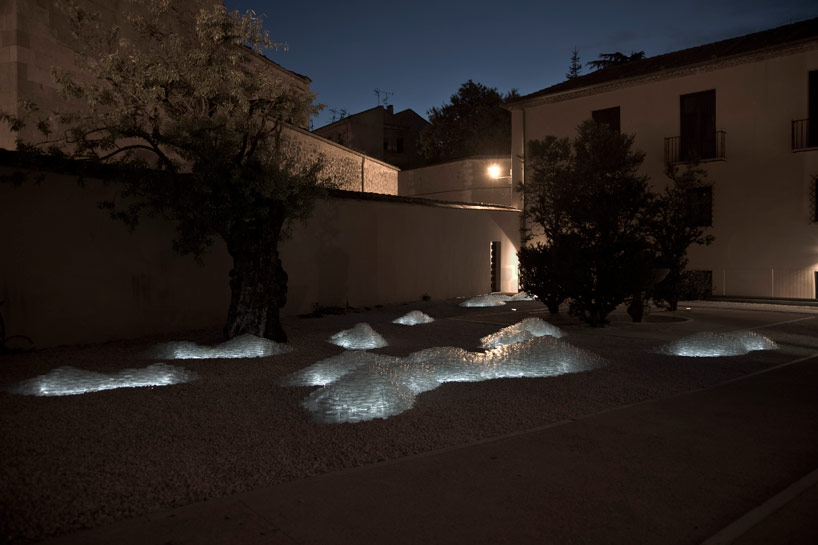 10,000 petri dishes create a mountainscape in palacio quintanar