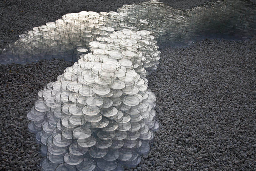 10,000 petri dishes create a mountainscape in palacio quintanar