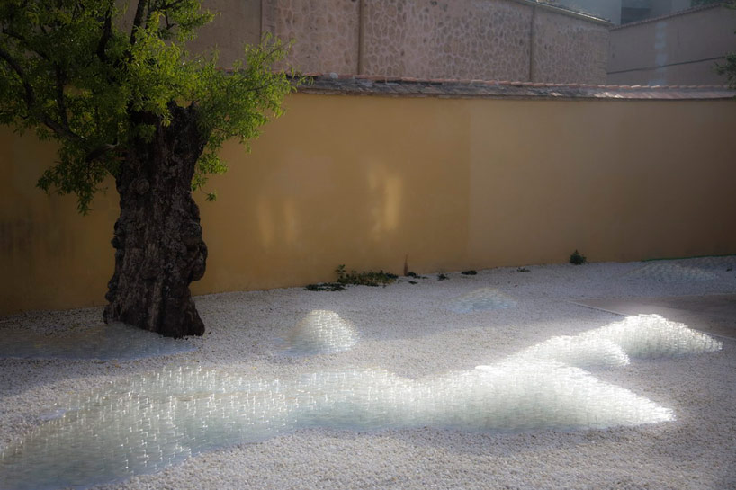 10,000 petri dishes create a mountainscape in palacio quintanar